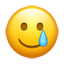 Emoji uśmiechniętej twarzy ze łzą U+1F972